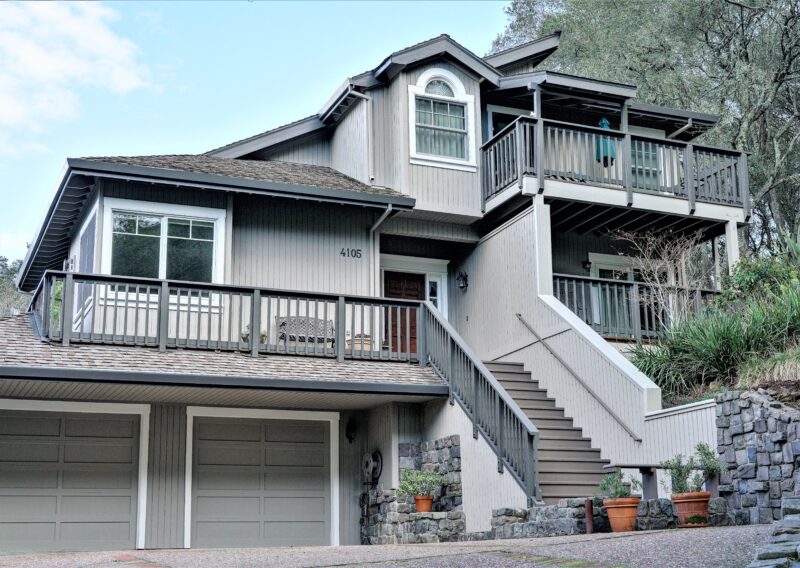 Stucco, siding and brick exterior painting