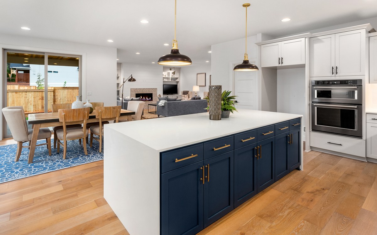 kitchen with dining room and living room in the background