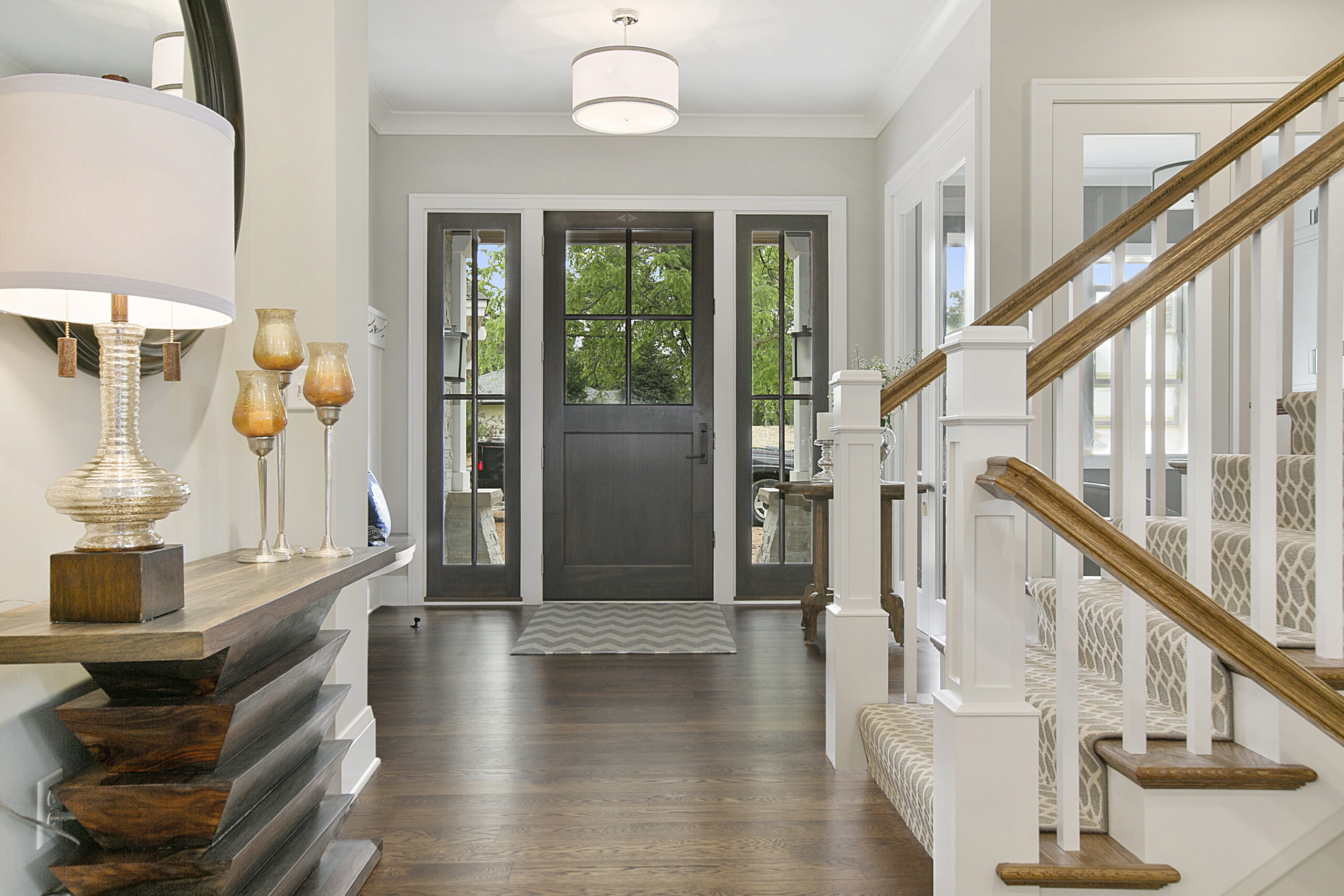 Front door of home with beautiful floor plan design How to Choose Foyer Paint Color